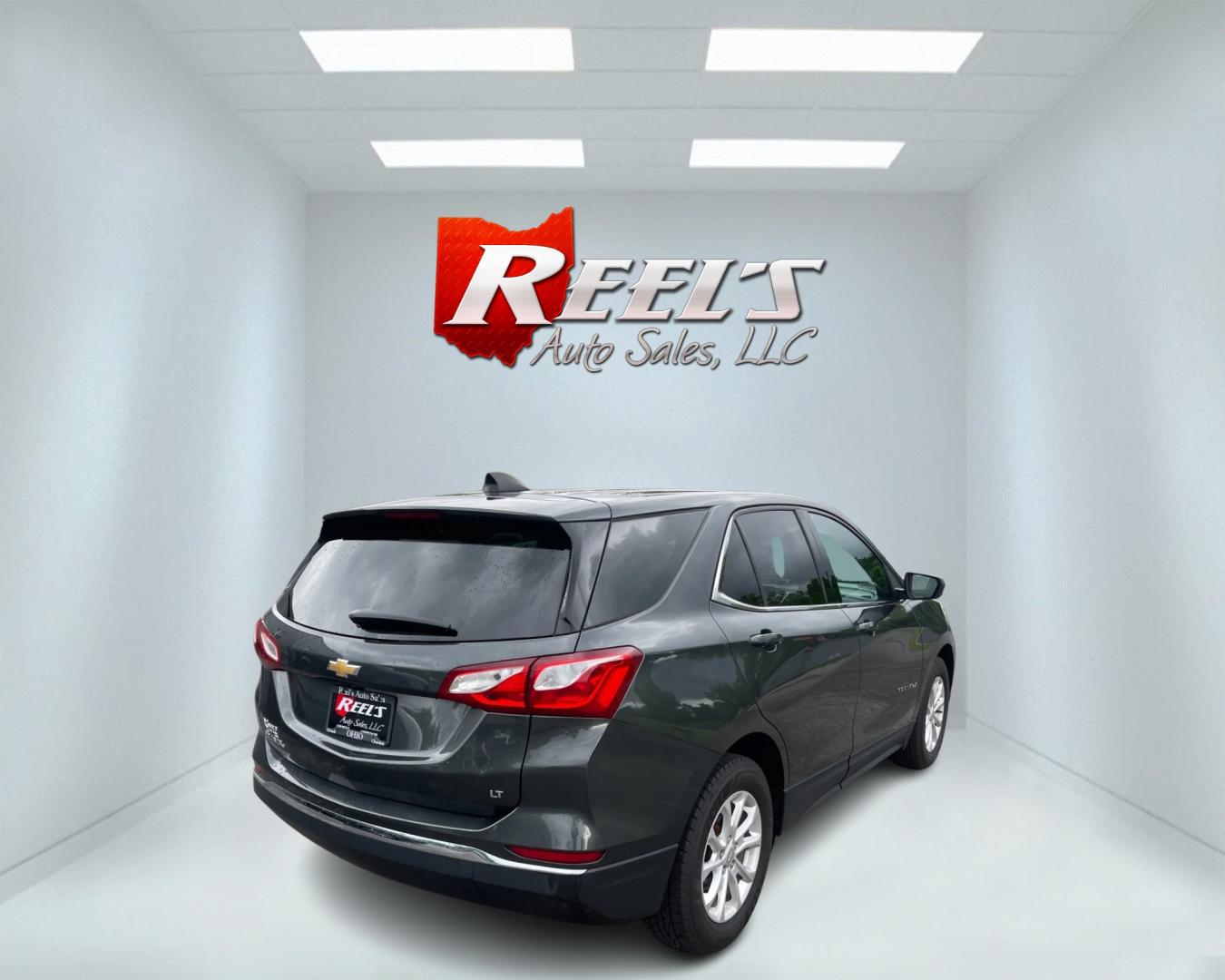 2020 Gray /Black Chevrolet Equinox LT 2WD (3GNAXKEV8LL) with an 1.5L I4 DIR DOHC 16V TURBO engine, 6A transmission, located at 547 E. Main St., Orwell, OH, 44076, (440) 437-5893, 41.535435, -80.847855 - This 2020 Chevrolet Equinox LT FWD is a practical and efficient compact SUV. It's powered by a 1.5L turbocharged I4 EcoTec engine mated to a 6-speed automatic transmission, delivering an impressive 31 mpg on the highway. Exterior features include LED daytime running lights, dusk-sensing headlights, - Photo#4